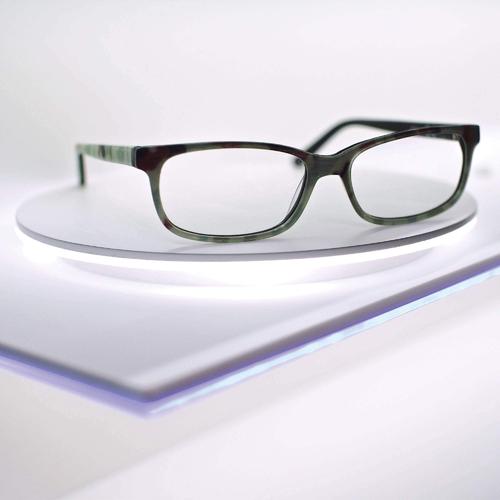 Panorama - rotatable acrylic wall eyeglasses shelf. Integrated LED lighting.