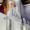 Logo holder for rod, exchangeable paper insert