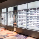 STK wall display with shelves, 930x1530x320 mm, LED, 5 logo holders incl.