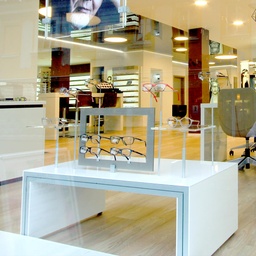 Shop window table, aluminium construction with side plates, acrylic top plate with holes