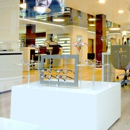 Shop window table, aluminium construction covered with 4 acrylic plates, acrylic top plate with holes